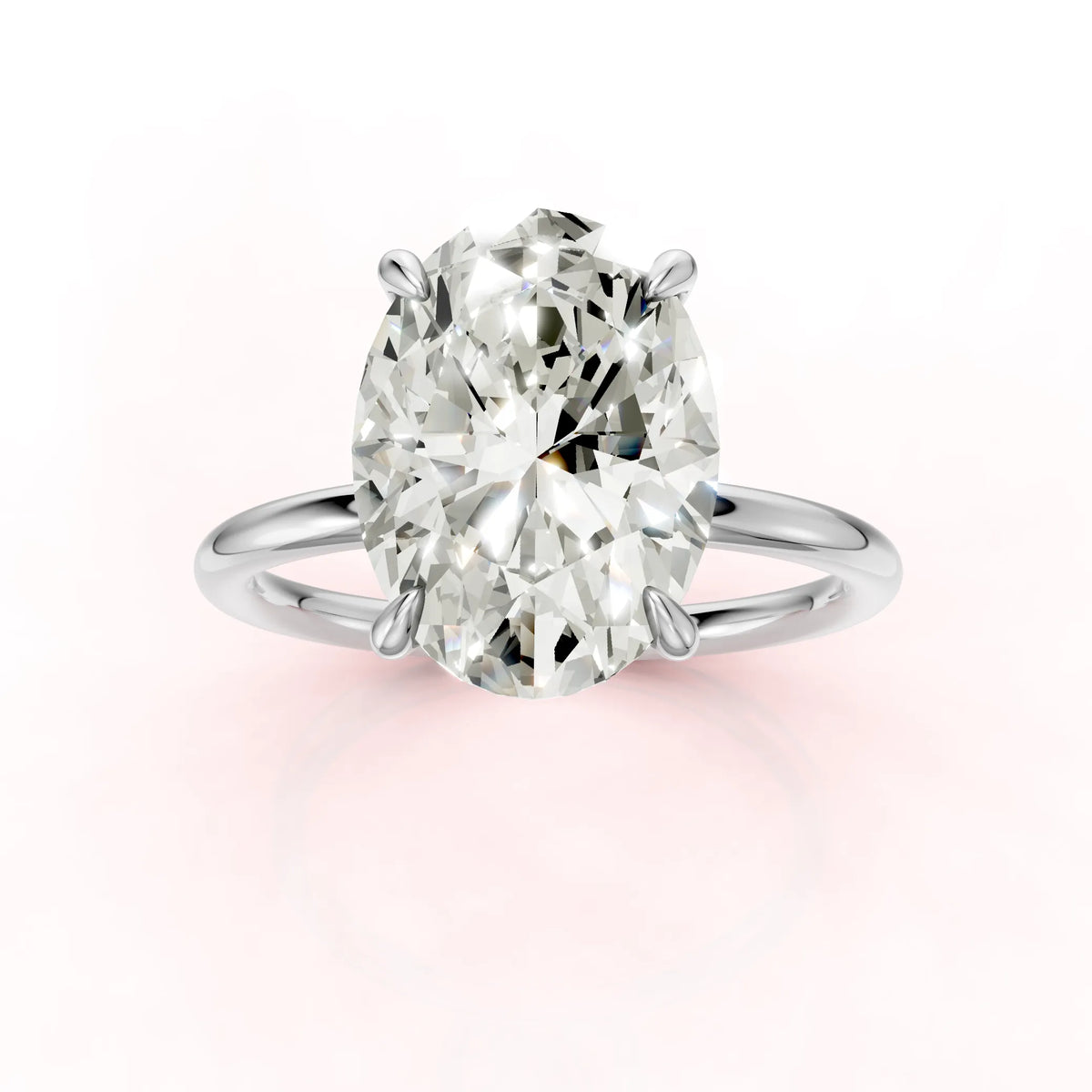 Valkokultainen Ovaali Timanttisormus