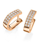 18 K keltakultaiset timanttikorvakorut. Tappikiinnitys ja 0.32 ct briljanttihiottuja timantteja.