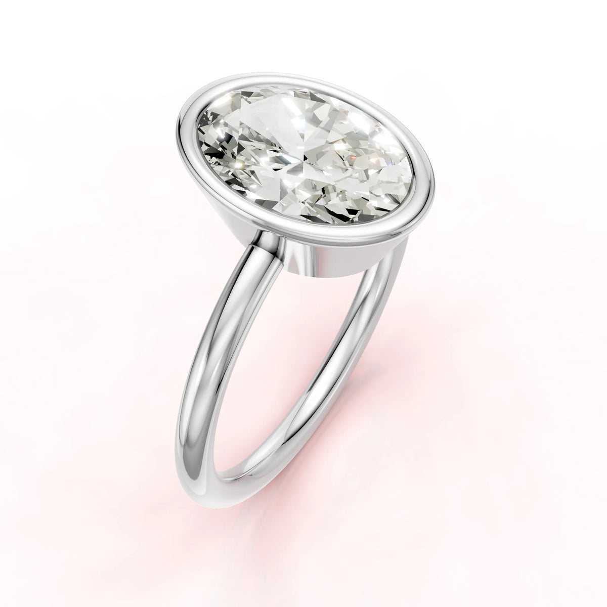 Valkokultainen Ovaali Bezel -istutettu sormus