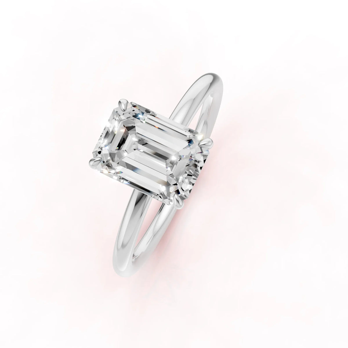 Valkokultainen Emerald Timanttisormus